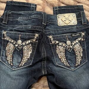 Miss Me size 27 x 30 Mid rise skinny Beautiful angel wings on back pockets
